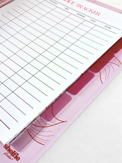 Pink and white dice tracker with grid layout on a white background