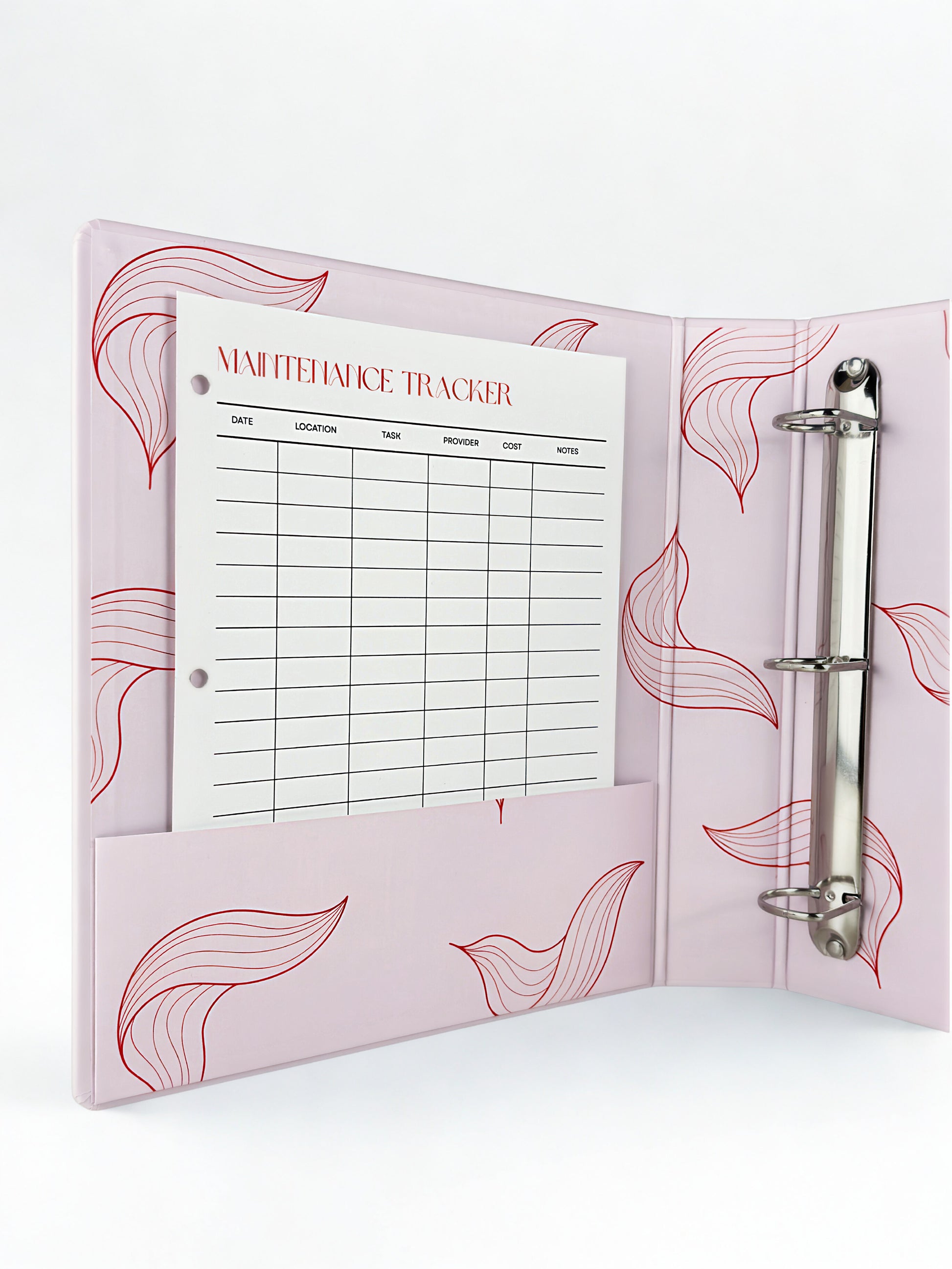 Pink planner with a white page displaying 'Maintenance Tracker' on a white background
