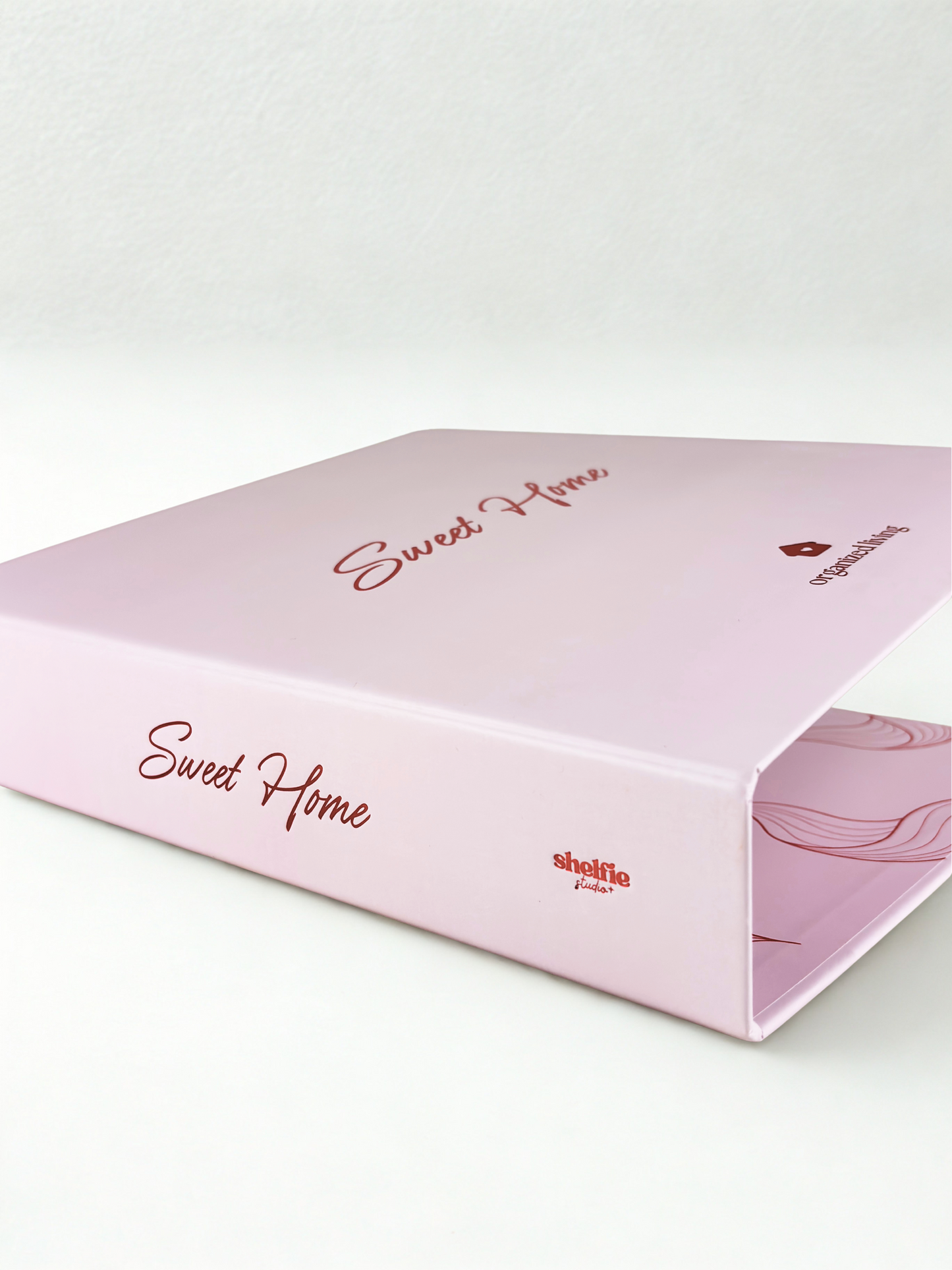 Pink box with 'Sweet Home' text on a white background